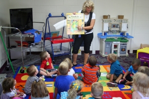 Mrs. Gillett shares a story about Franklin and how he goes back to school with her pre-kindergarten students. Photo By Chris Evans