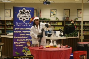 The mad scientist demonstrates a project in front of students. Photo By Chris Evans