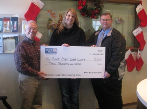 (L to R) Steve Gentling, President United Way; Shayla Simpson, Smart Start Coordinator; and Chuck Hayes, United Way during a presentation of a grant to Smart Start to support children programs throughout Logan County.