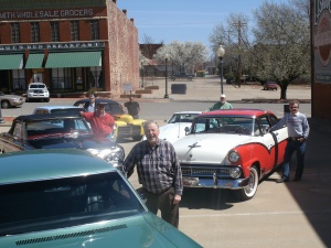 Guthrie Mayor Chuck Burtcher, center, stands along with some of his fellow classic car friends in Guthrie. They will be participating in the Geezers and Gassers Car Show and Poker Walk in downtown Guthrie on Friday, April 19 from 6 to 9 p.m.
