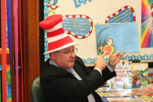 Supt. Mike Simpson took time out to read to Mrs. Jamie Alexander's second grade students celebrated Dr. Suess' birthday. Photo By Chris Evans