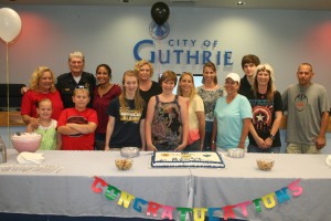 Lt. Dan Belk is surrounded by family as he concludes 29 years of service at the Guthrie Police Department.