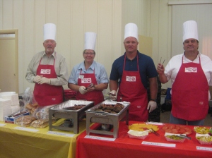 Celebrity Chefs prepare to serve during the 2012 United Way of Logan County Kickoff.