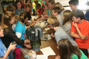 Students at Guthrie Upper Elementary learn the fundamentals on gas and oil through science. Photo By Chris Evans