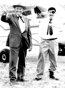 Lester Lurk (aka Will Rogers) and Joe Bacon (aka Wiley Post) will be joining other dignitaries at the ‘89er Celebration in Guthrie America. “Will and Wiley” are shown here at the Claremore Airport “Fly in”  two years ago.