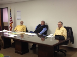 County Commissioners (L-R) Mike Pearson, Monty Piercy and Marven Goodman listen to county business owners on Friday morning.