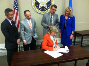 Gov. Fallin signs HB 1948 with Sen. Ervin Yen, House Speaker Jeff Hickman, Rep. Doug Cox and Sen. A.J. Griffin (left to right).  